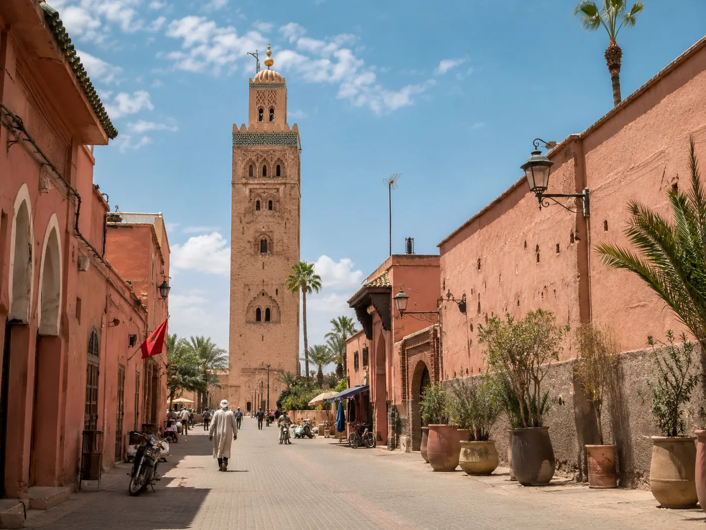 Koutoubia Mosque minaret and medina street, Marrakech, Morocco